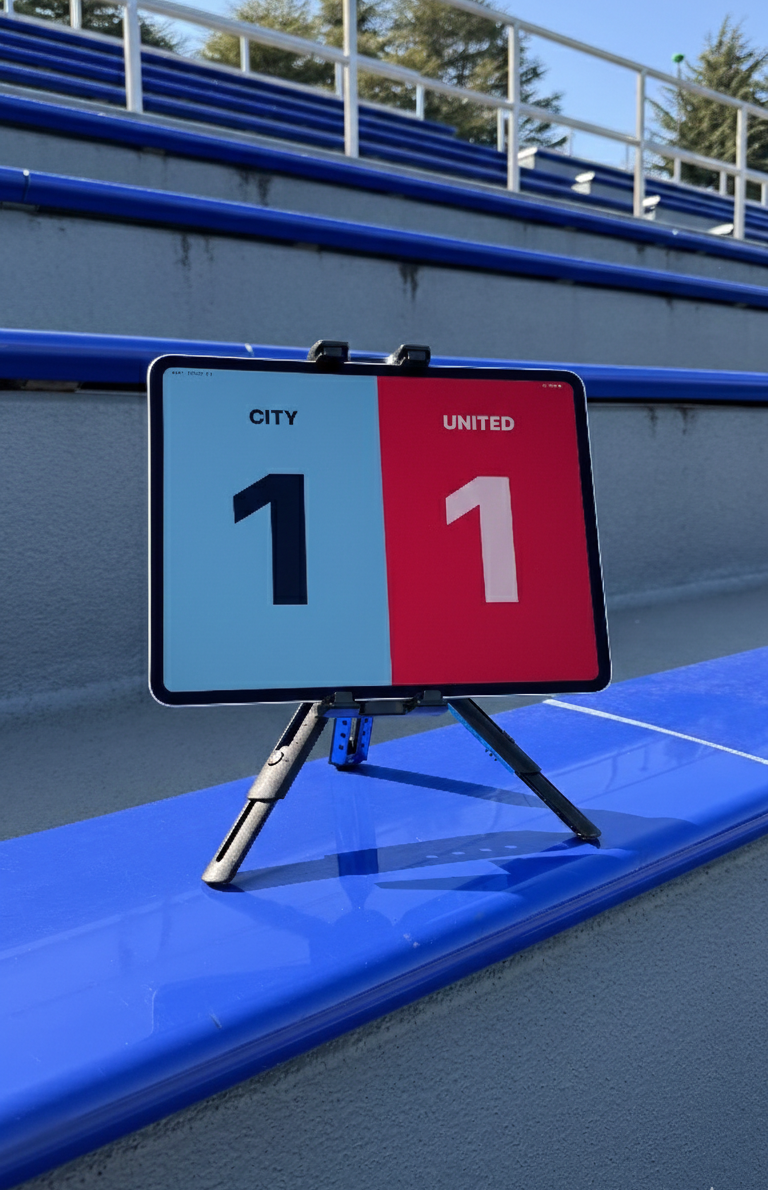 SunnyPitch showing 1–1 on a stadium touchline